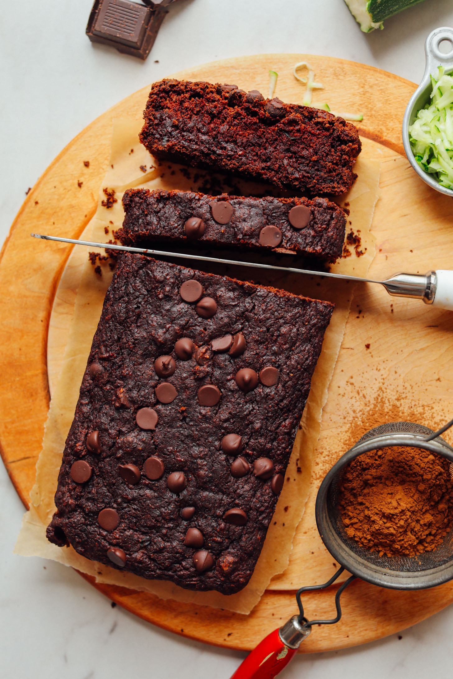 Slicing into Vegan Chocolate Chip Zucchini Bread