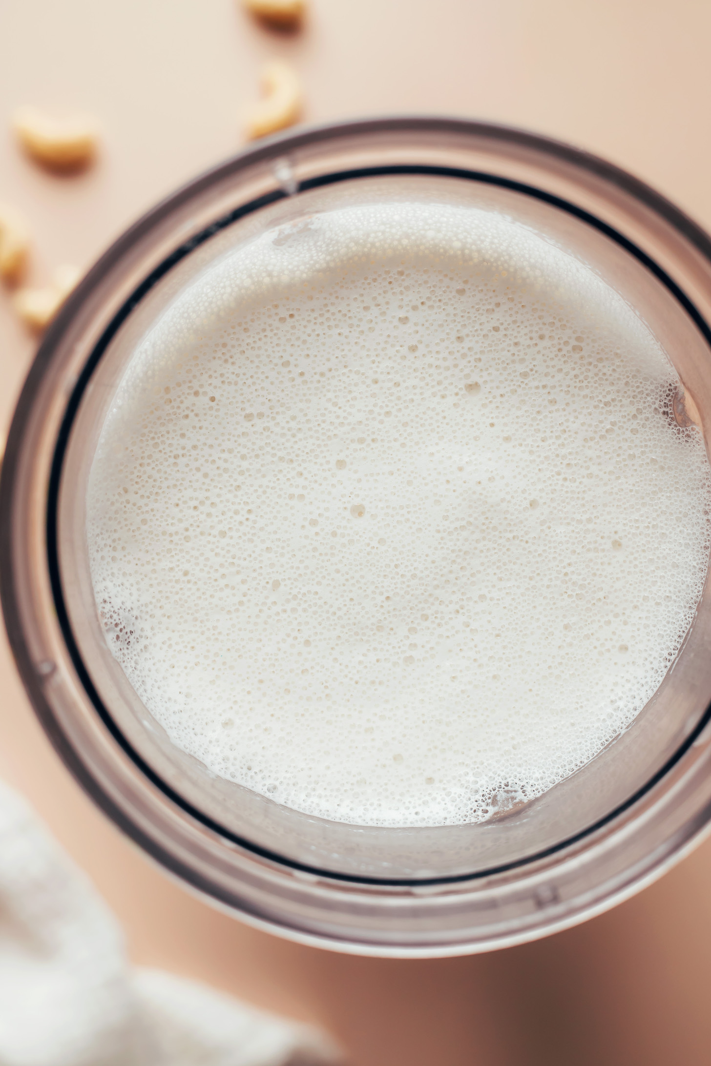 Frothy cashew milk in a blender