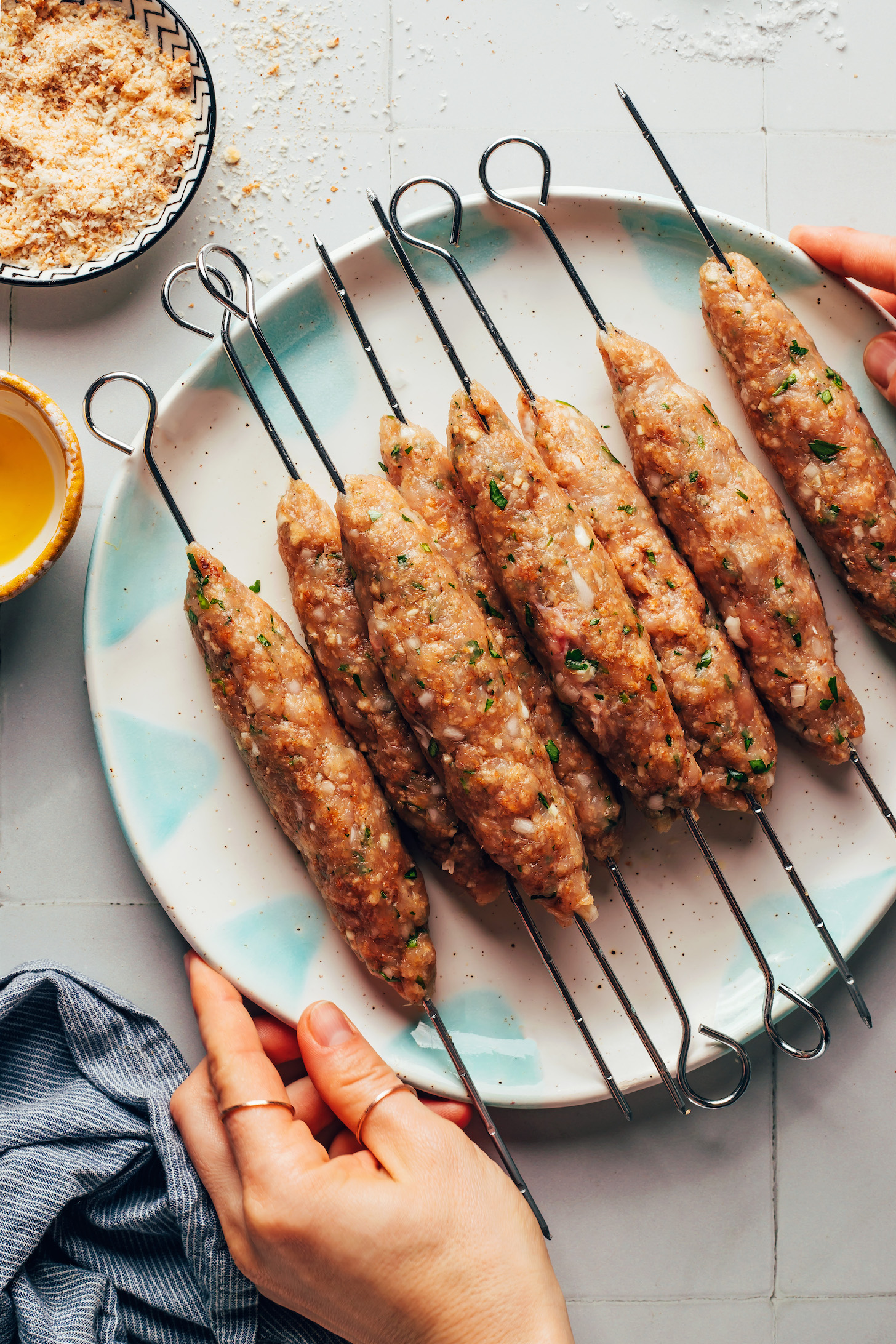 Plate of chicken kofta kebabs before grilling