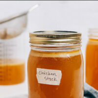 Jar of easy instant pot chicken stock