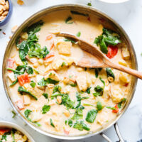 Skillet of vegetable panang curry with tofu